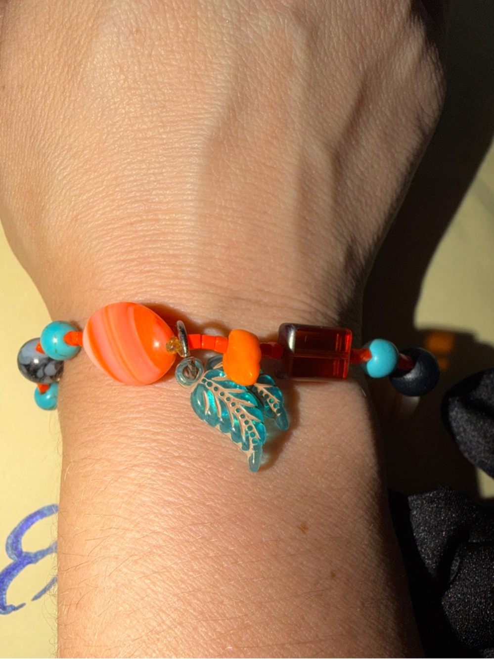 808 beads nwt Handmade Orange Beaded Bracelet with Turquoise Leaf Charm